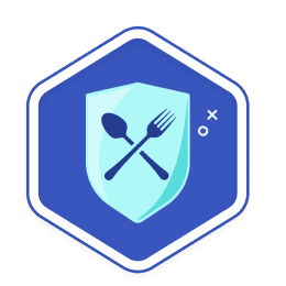 Icon for Weekend Warrior Challenge, light-blue shield with spoon and fork on its front, on a blue hexagon