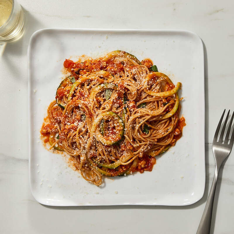 Spicy spaghetti and zucchini noodles with turkey bolognese by Millie Peartree