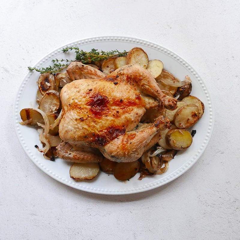 Photo of Roast Chicken and Chicken Dripping Potatoes by Michael Ligier by WW