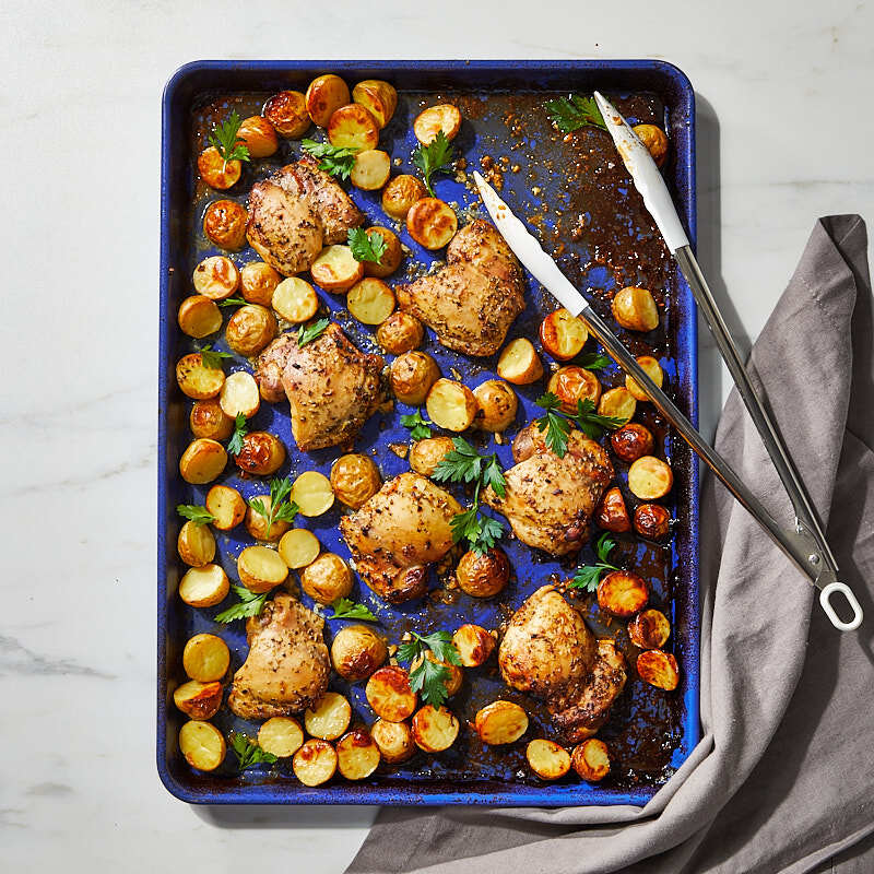 Photo of Greek lemon-chicken thighs and potatoes by WW