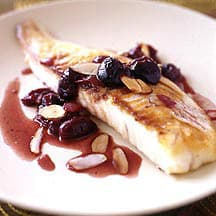 Photo of Sautéed tilapia with almonds and cherries by WW