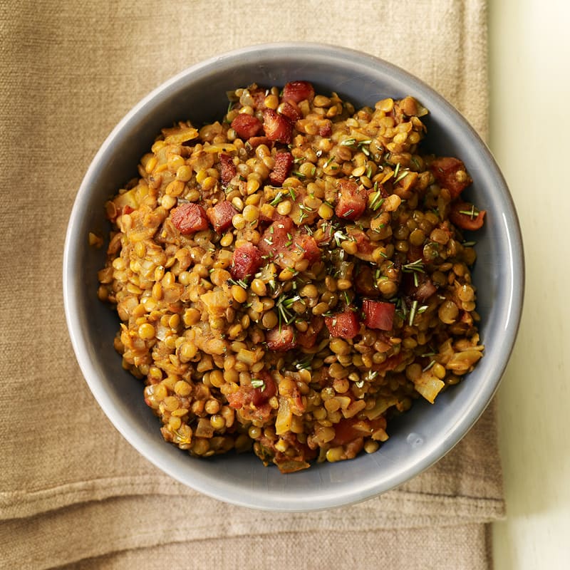 Photo of Warm lentil salad with pancetta, tomato, and rosemary by WW