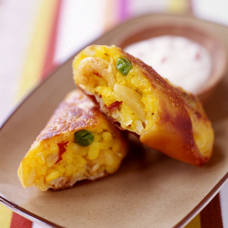 Photo of Paella Egg Rolls with Roasted Pepper Cream Sauce by WW