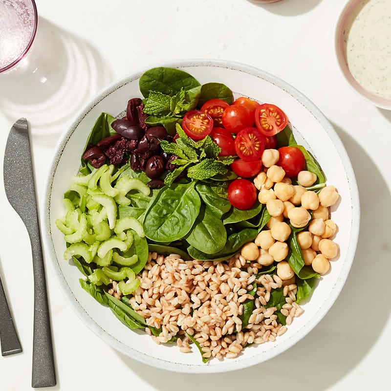 Photo of Cat Cora’s spinach, chickpea, and tahini bowl by WW