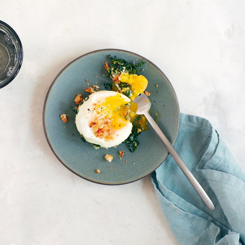 Photo of Baked eggs with kale Caesar salad by WW