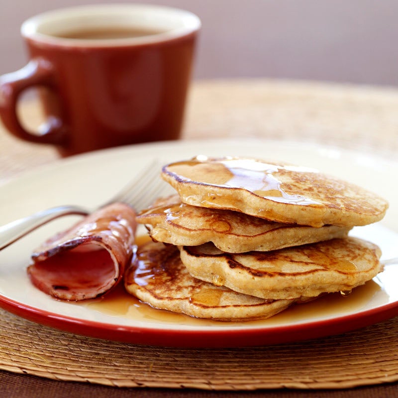 Photo of Multi-grain pancakes with Canadian bacon and maple syrup by WW