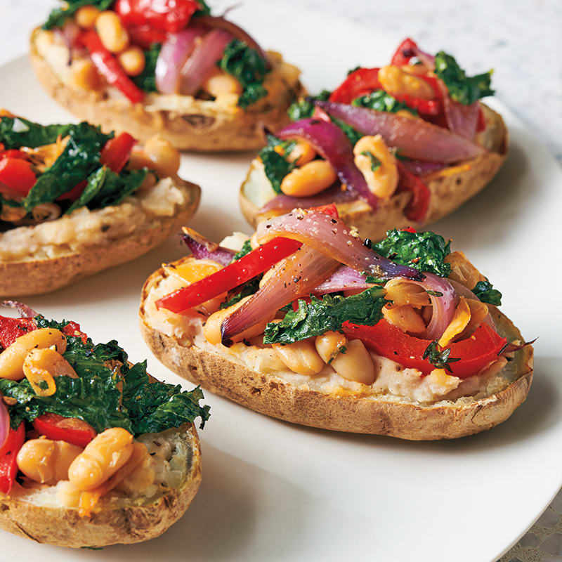Photo of Garlicky kale and bean–stuffed potatoes by WW