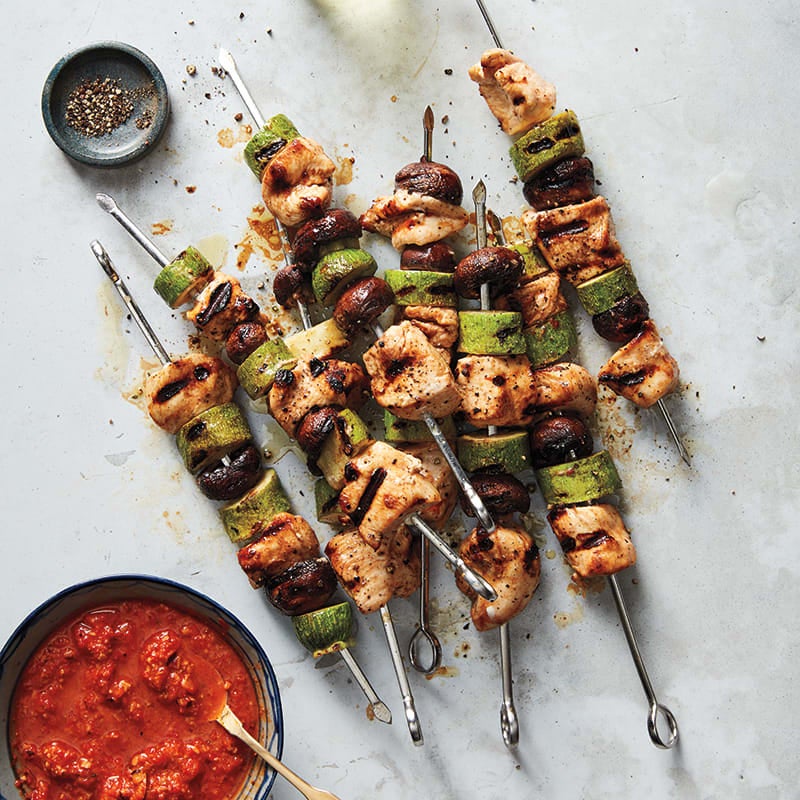 Chicken and veggie kebabs with romesco sauce