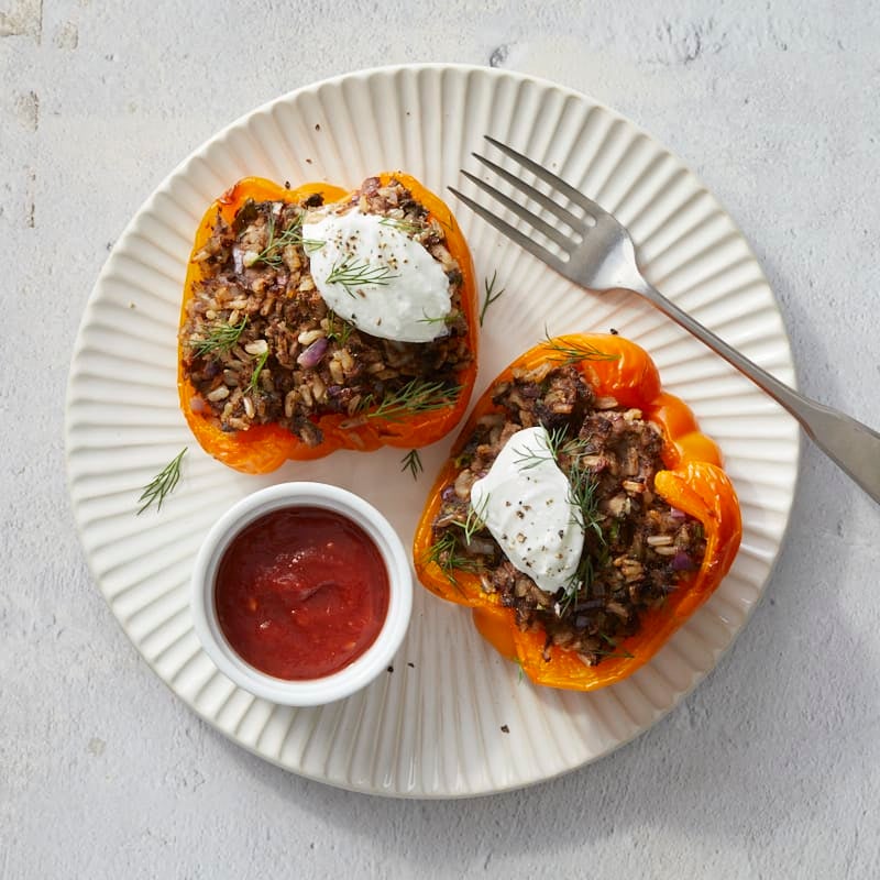 Beef and Rice–Stuffed Bell Peppers with Tomato Sauce