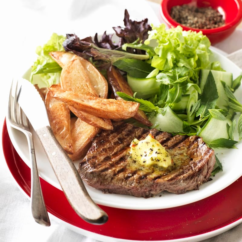 Photo of Steak with herb butter and potato wedges by WW