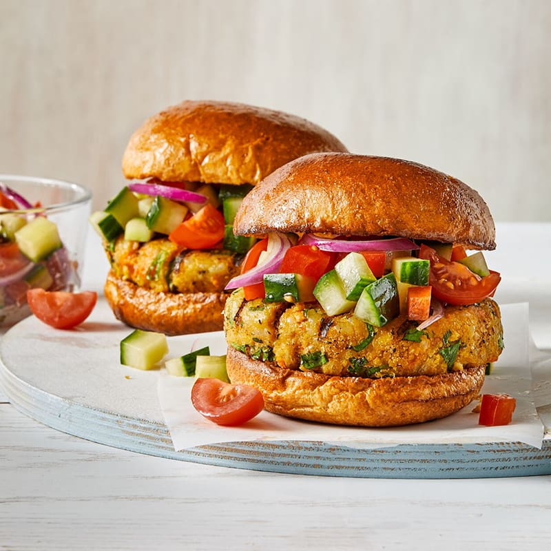 Photo of Chickpea & brown rice veggie burgers with tomato salad by WW