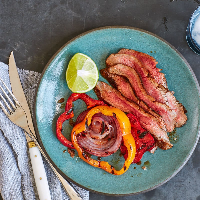 Photo of Coffee-Chili Rubbed Flank Steak with Peppers and Onions by WW