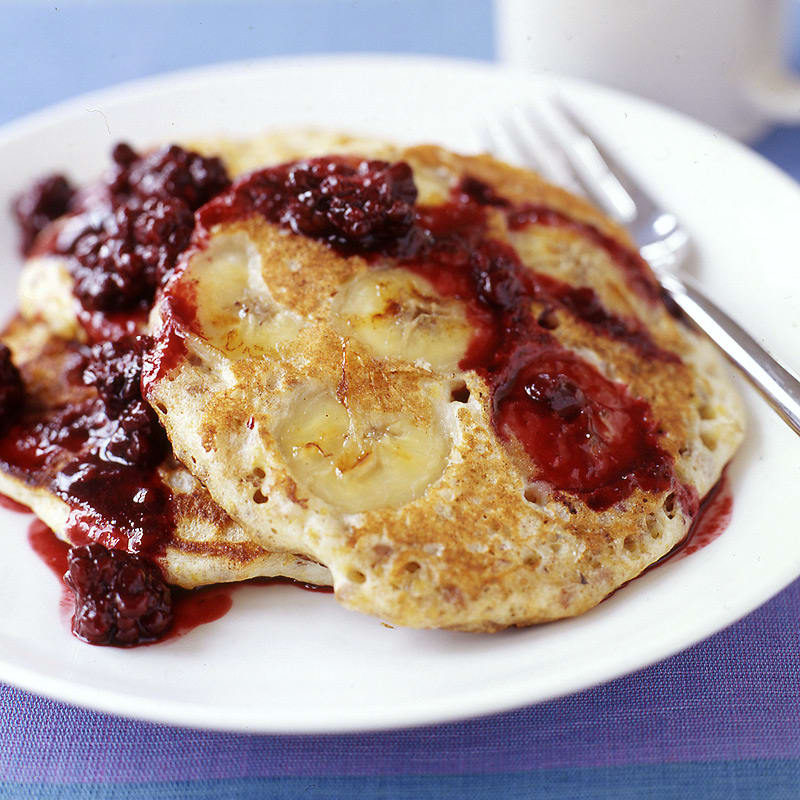 Photo of Whole-grain banana pancakes with blackberry syrup by WW