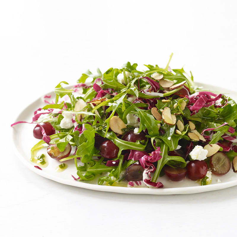 Photo of Arugula and radicchio with grapes, goat cheese, and Champagne vinaigrette by WW