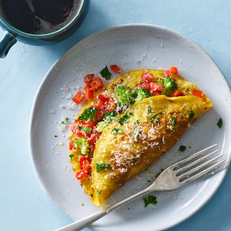 Photo of Cheesy broccoli, tomato & pepper omelet by WW