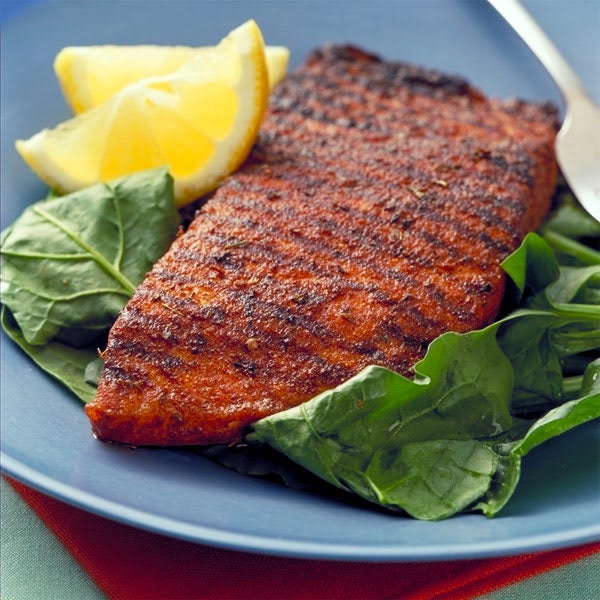 Photo of Spicy-crusted salmon over spinach by WW
