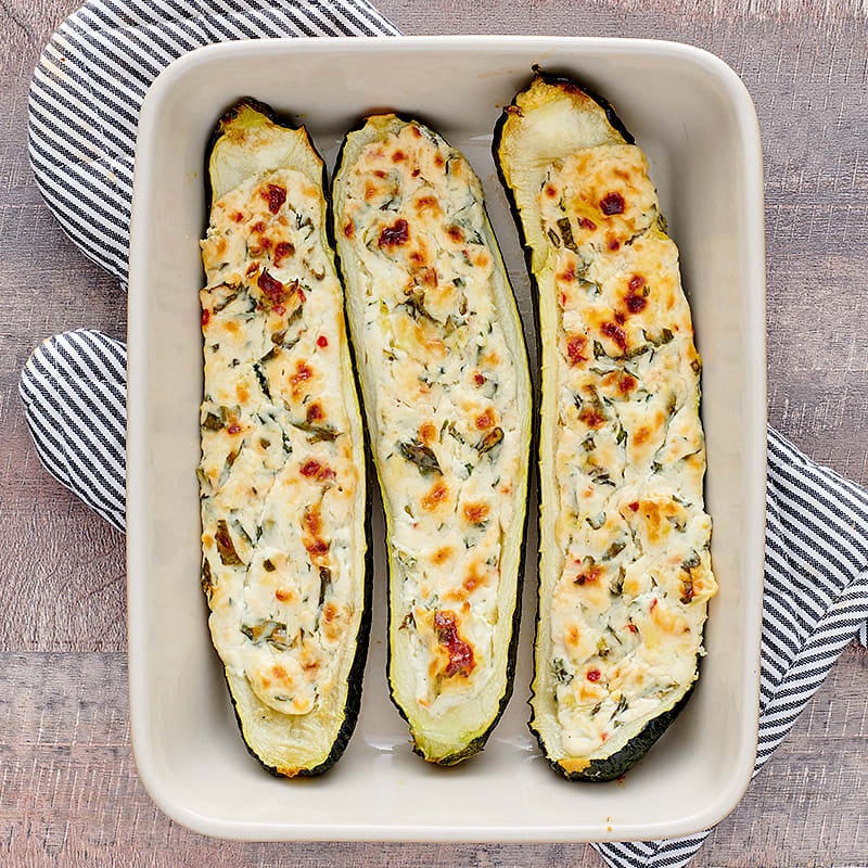 Photo of Cheese and Herb Stuffed Zucchini with Arugula Salad by WW