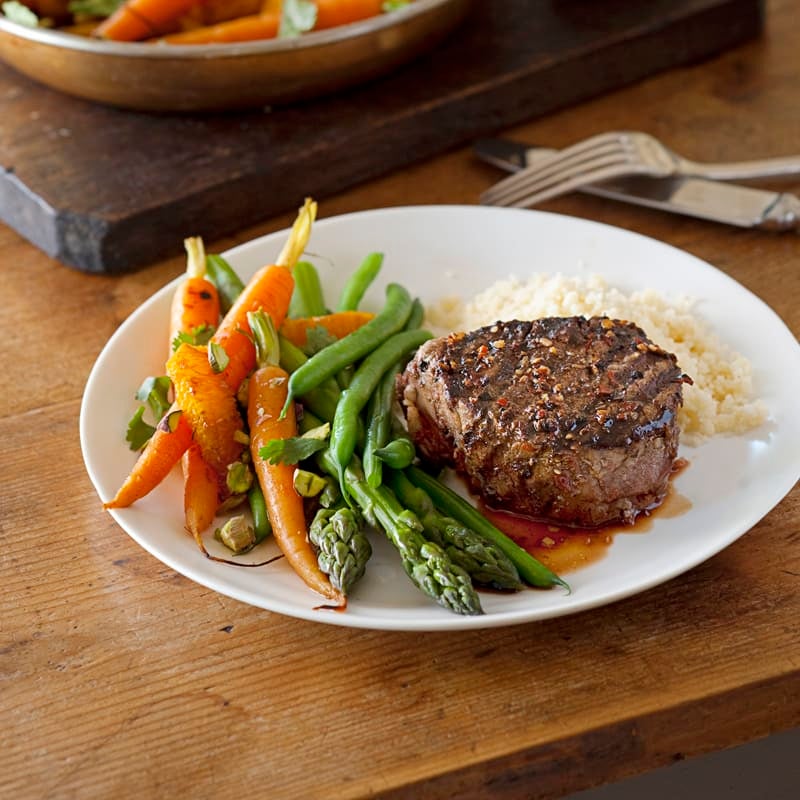Photo of Harissa steaks with coriander carrots by WW