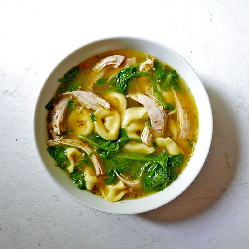 Photo of Slow cooker pesto chicken tortellini soup by WW