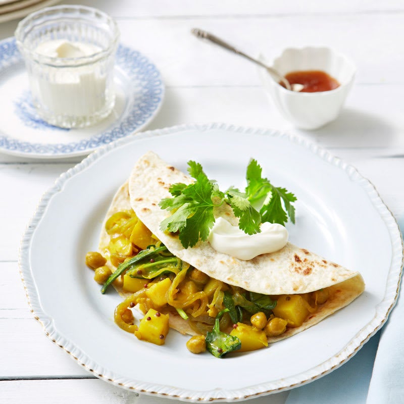 Photo of Indian dosa with potato and spinach curry by WW