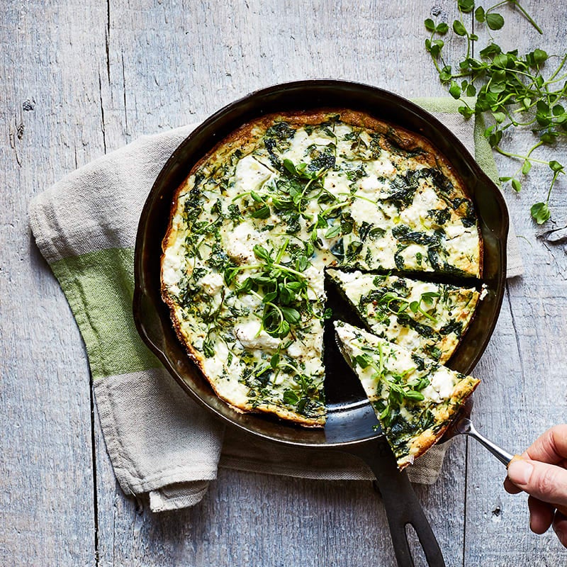 Photo of Skillet spinach, pea shoot, and spring herb pie by WW