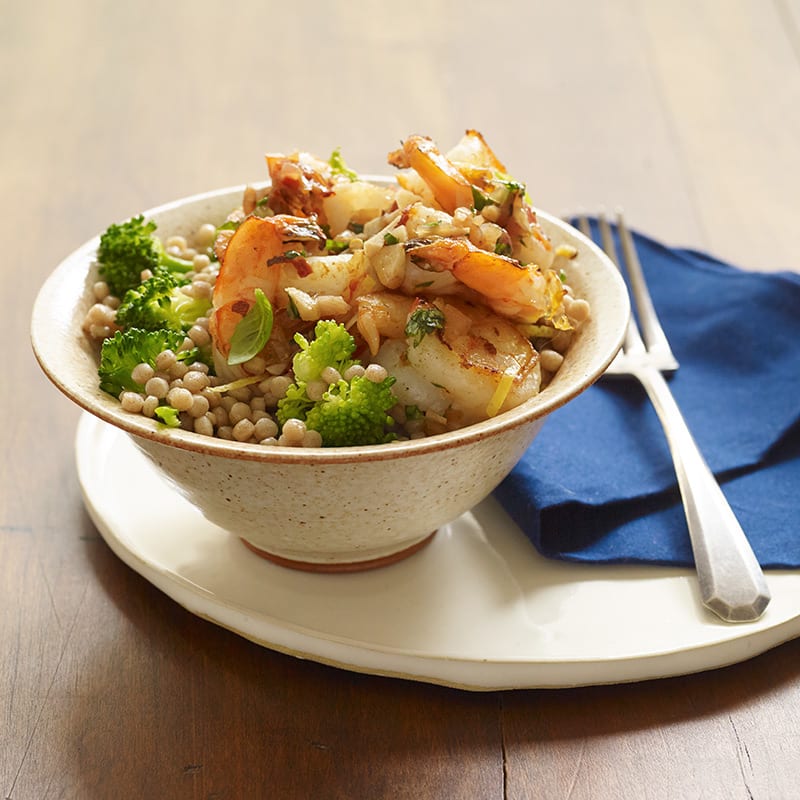 Photo of Lemon-garlic shrimp with couscous and broccoli by WW