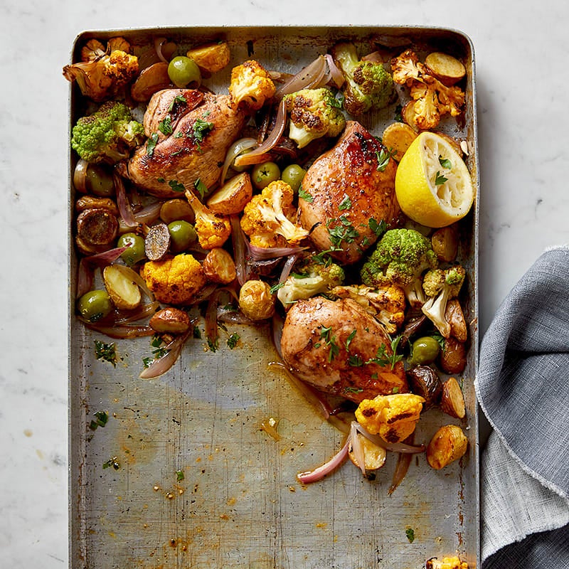 Garlic-thyme chicken with cauliflower, potatoes, and olives
