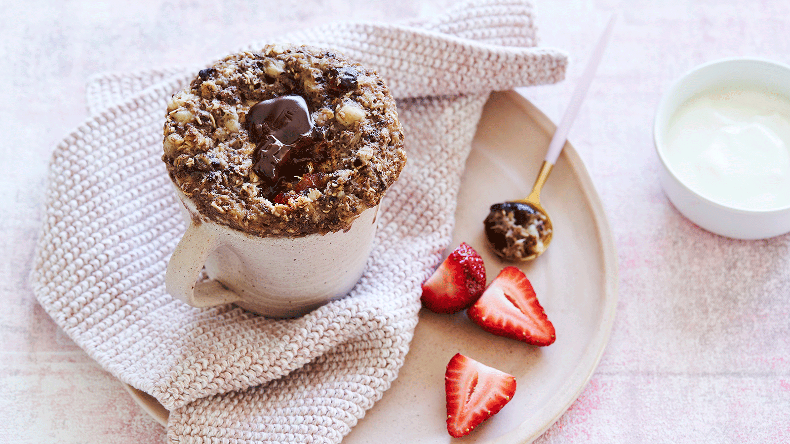 Double chocolate mug muffin with strawberries