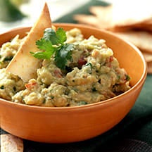 Photo of White bean and avocado dip with tortilla chips by WW