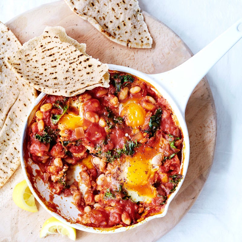 Photo of Shakshuka with white beans and kale by WW