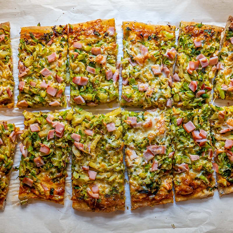 Photo of Five-ingredient Brussels sprouts & bacon sheet pan pizza by WW