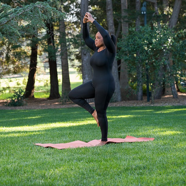 Oprah doing yoga