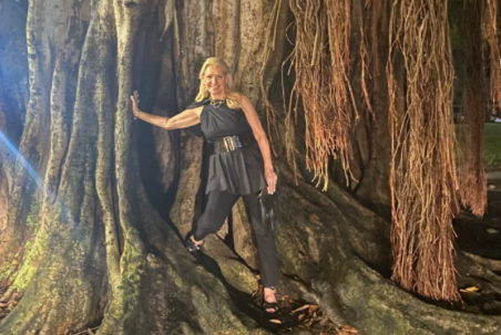 Mindy standing next to Banyan tree