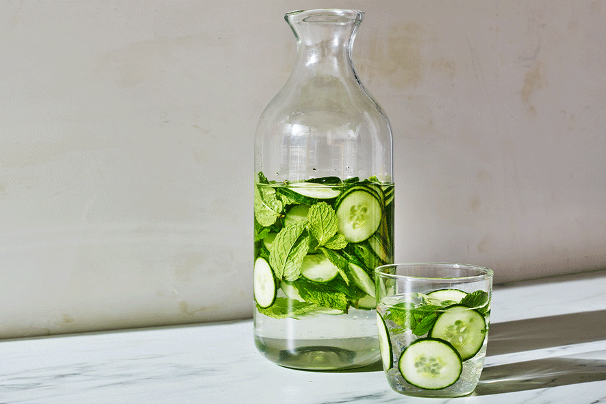 Water glass with cucumber mint