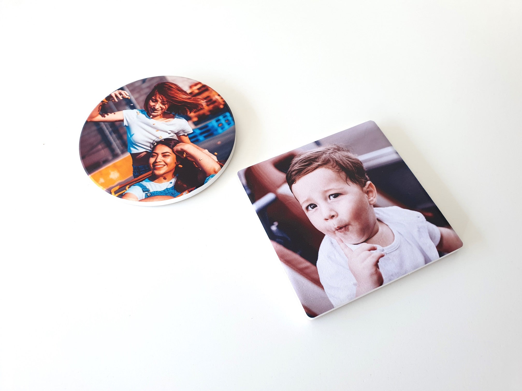 Image of one square and one circular personalised ceramic coaster