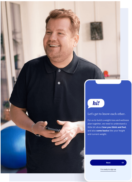 A smiling James Corden, wearing a black collared shirt, is holding his phone. An inset of a phone says “Hi! Let’s get to know each other.”